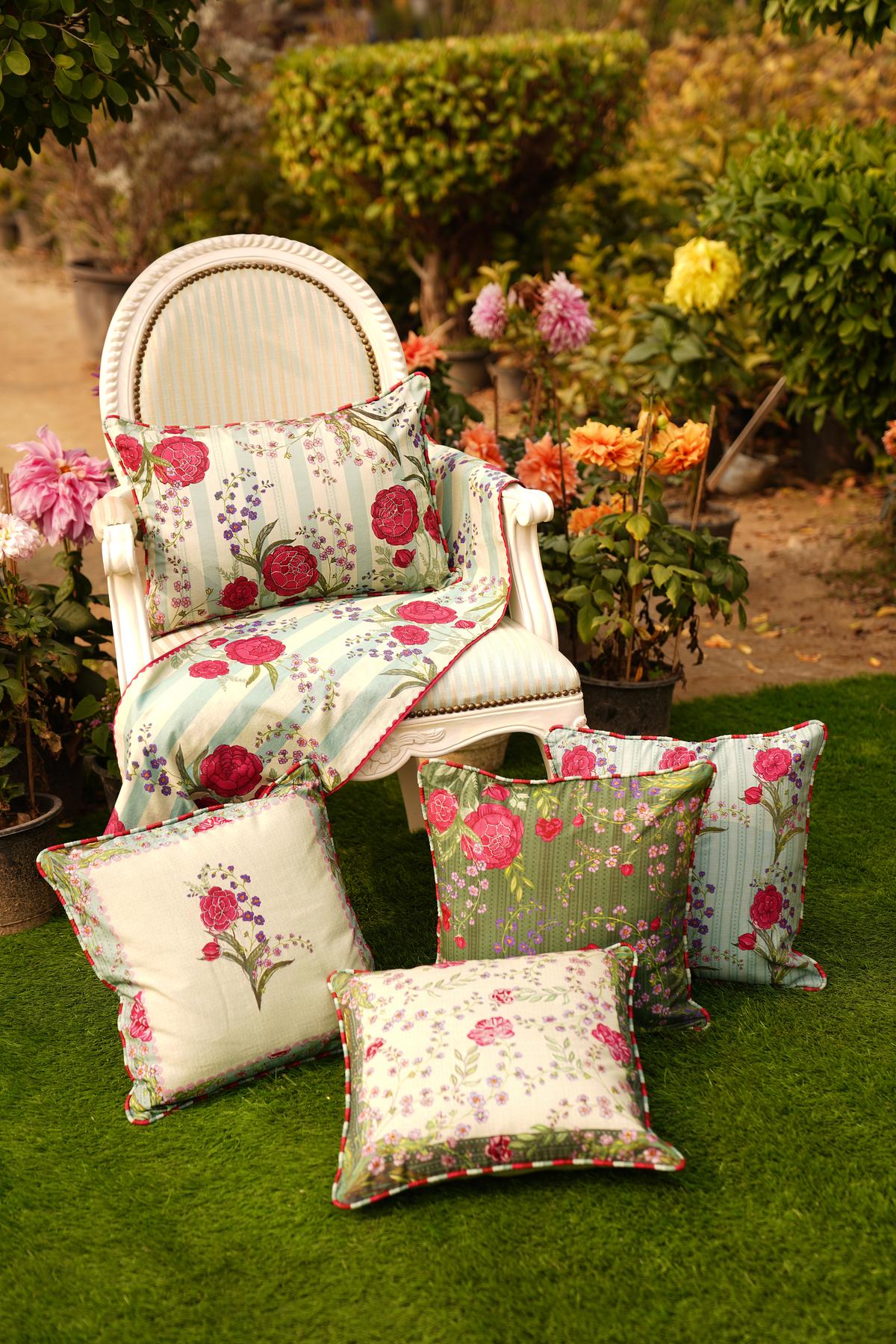 The botanical theme is extended into a wider lifestyle offering including home accents, tea sets, jewellery, footwear, and bags The botanical theme is extended into a wider lifestyle offering including home accents, tea sets, jewellery, footwear, and bags