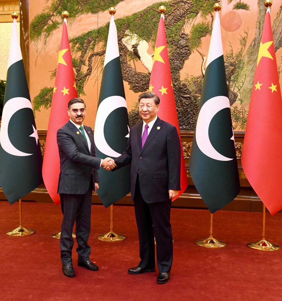 Pakistan caretaker PM Anwaar ul Haq meets Chinese President Xi Jinping in Beijing on October 19, 2023
