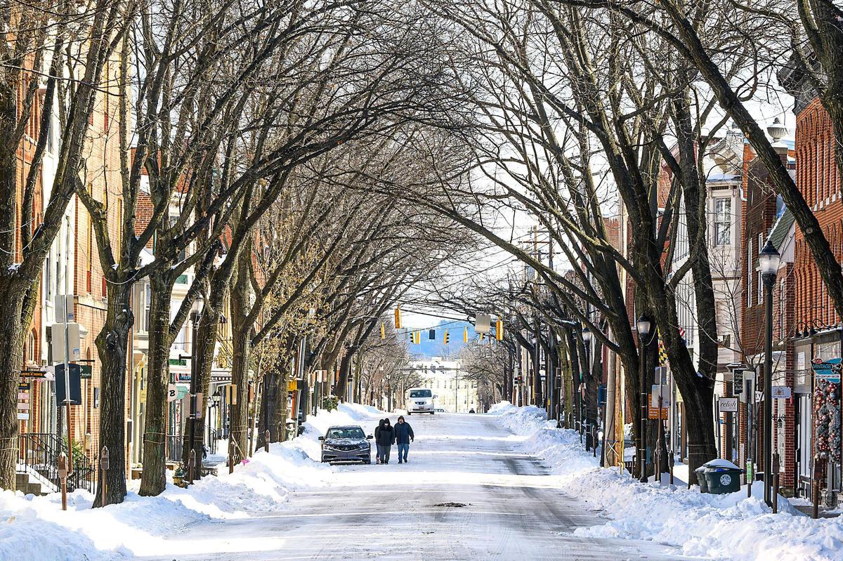 A roads sits almost empty in downtown Frederick, Md. after a snowstorm that dumped approximately 10 inches of snow. A roads sits almost empty in downtown Frederick, Md. after a snowstorm that dumped approximately 10 inches of snow.