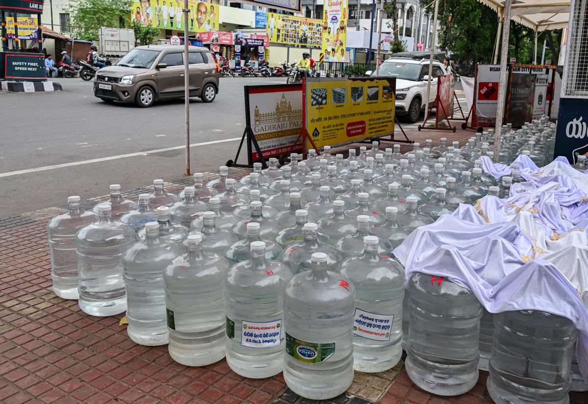 Drinking water cans were arranged at Lumbini Park gate near Appughar, on Tuesday, where GVMC has set up a free water supply kiosk for devotees participating in the Giri Pradakshina, the annual festival of Sri Varaha Lakshmi Narasimha Swamy, scheduled for July 9 in Visakhapatnam. Drinking water cans were arranged at Lumbini Park gate near Appughar, on Tuesday, where GVMC has set up a free water supply kiosk for devotees participating in the Giri Pradakshina, the annual festival of Sri Varaha Lakshmi Narasimha Swamy, scheduled for July 9 in Visakhapatnam.