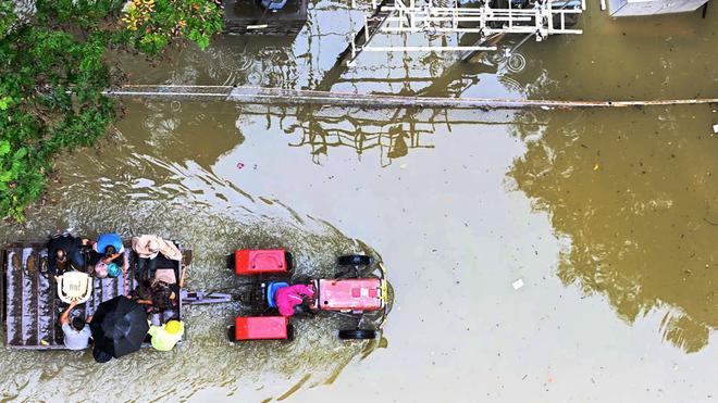 Tractors-back-to-rescuing-stranded-residents-of-floodprone-areas-