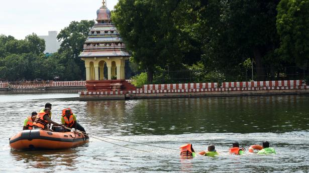 Fire and Rescue Services personnel conduct drill&nbsp;