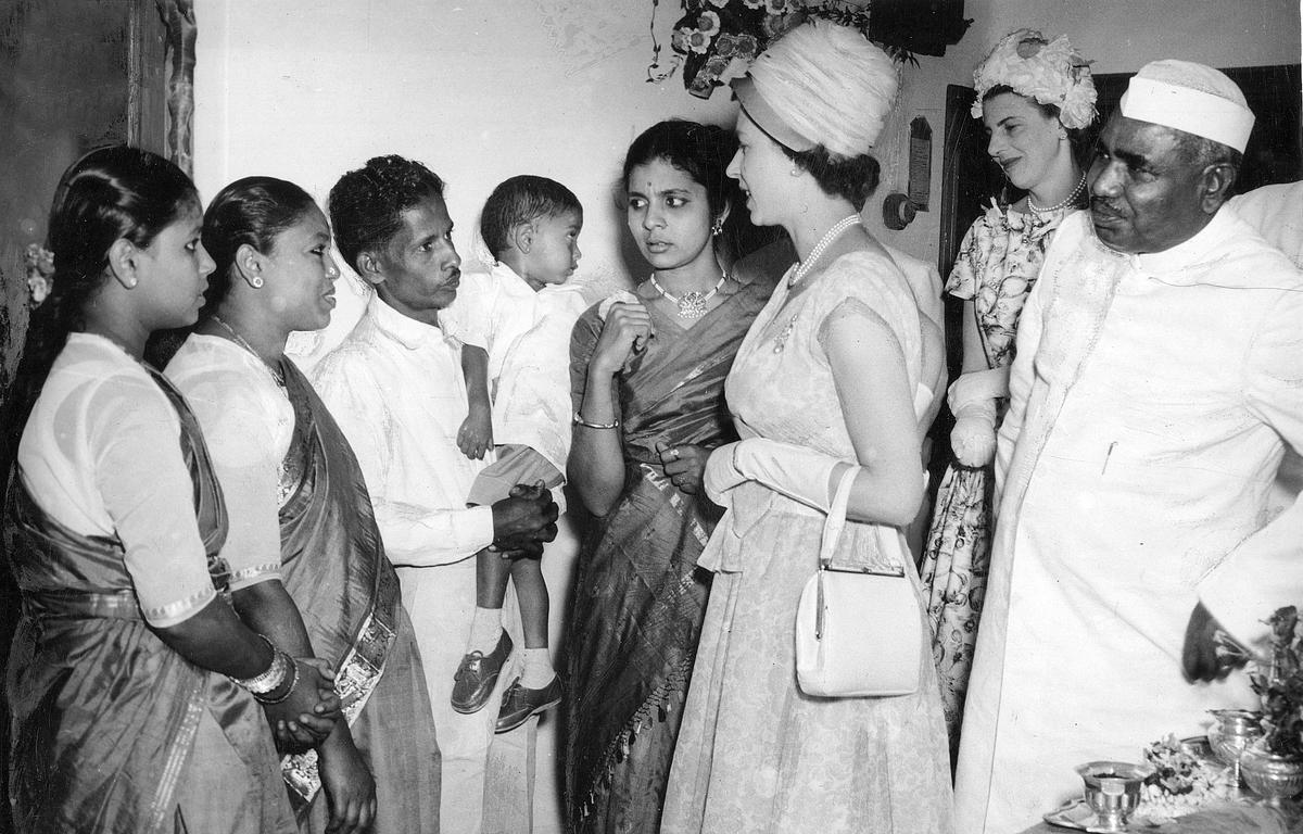 Queen Elizabeth II interacting with some of the families at quarters of the Integral Coach Factory at Ayanavaram on February 20, 1961. The then Union Minister for Railways Jagajeevan Ram is at left. 