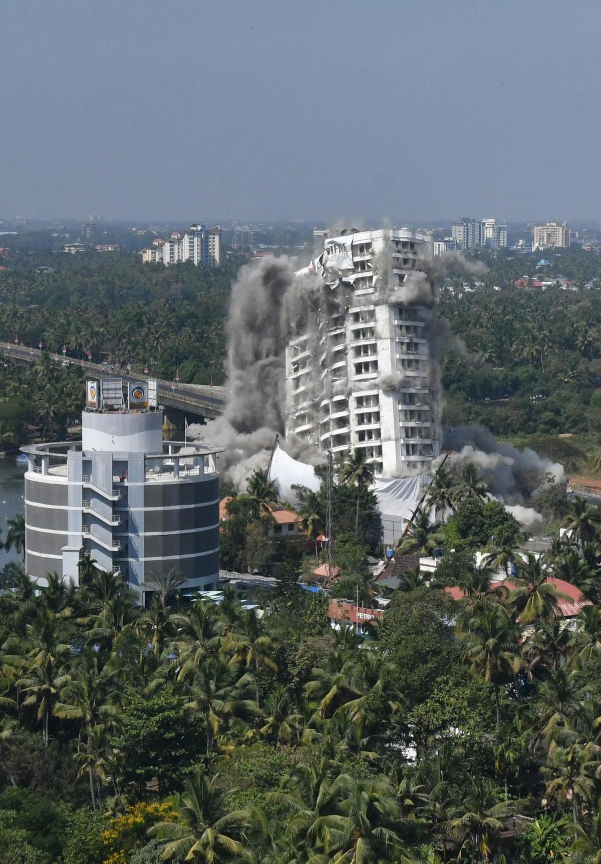 Holy Faith apartment complex, a towering 67-metre-tall structure, being pulled down by implosion on January 11, 2020 following a Supreme Court order. It was the first-ever such demolition carried out in Kerala.