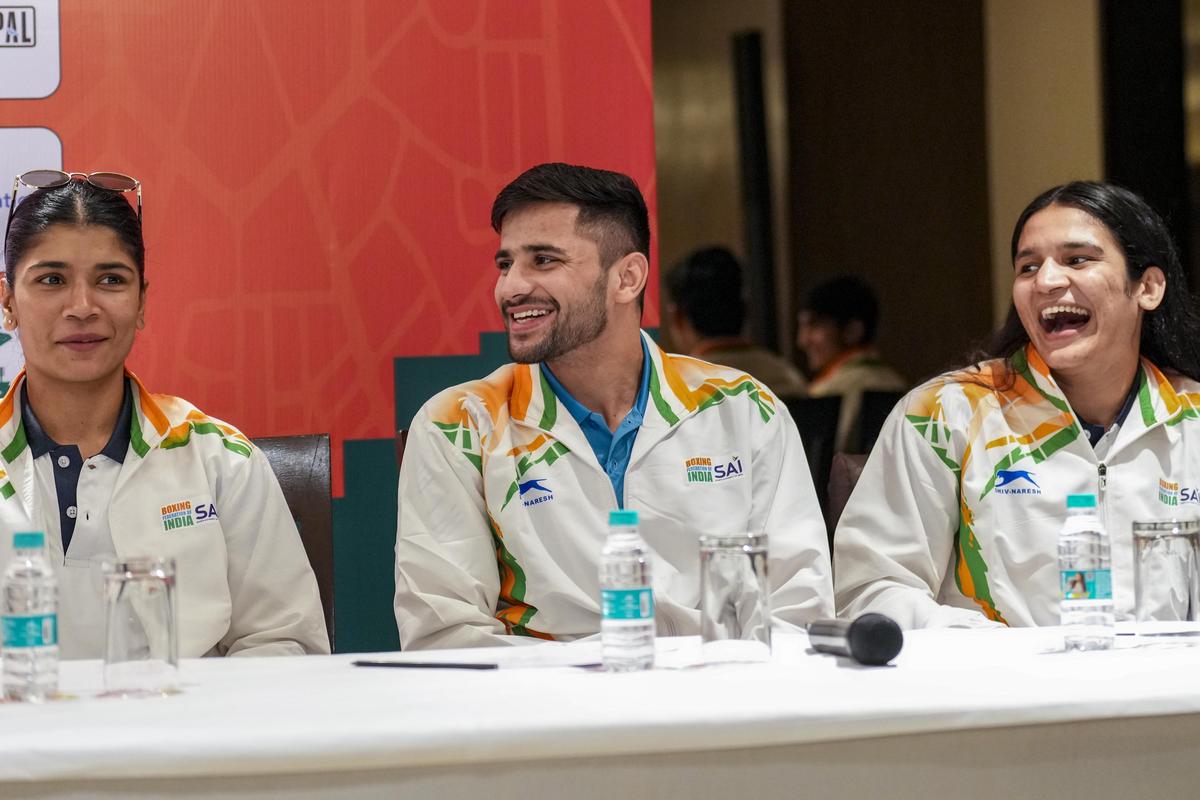 World Boxing Cup Finals 2025 gold medallists Nikhat Zareen, Sachin Siwach and Arundhati Choudhary during a press meet, in New Delhi, Friday, Nov. 21, 2025. 