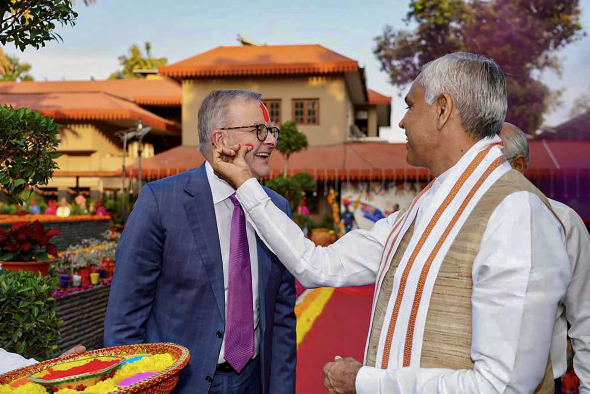 Prime Minister of Australia Anthony Albanese with Gujarat Governor Acharya Devvrat during Holi celebrations in Ahmedabad.