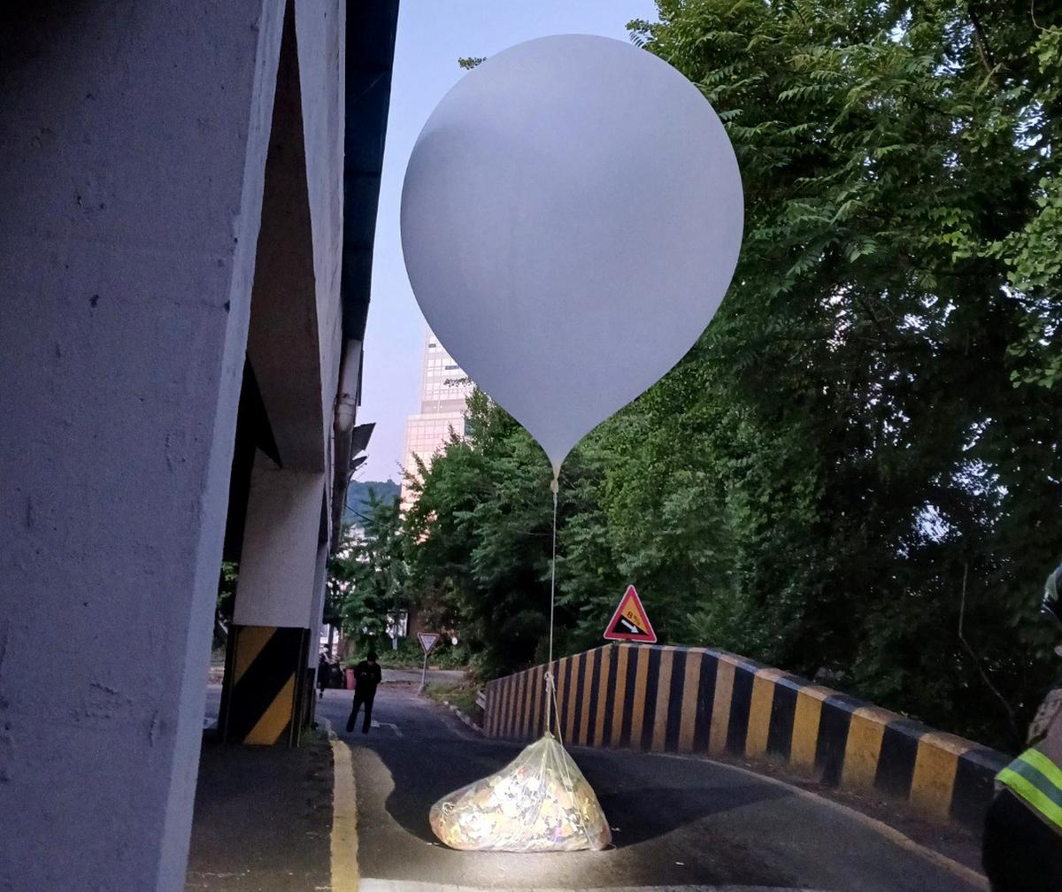A balloon believed to have been sent by North Korea, carrying various items including garbage, is pictured in Incheon, South Korea, June 2, 2024.      