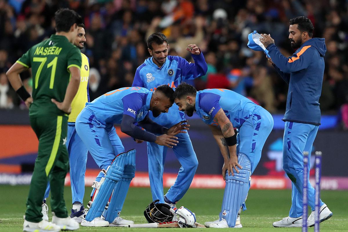 Kohli and Hardik Pandya celebrate India’s win.