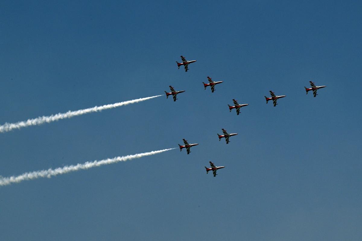 The IAF’s Surya Kiran Aerobatic Team (SKAT) showcase breathtaking manoeuvres in their iconic red-and-white Hawk Mk-132 jets, over a large number of visitors attending on the fourth day of AERO INDIA 2025 - Airshow at IAF Yelahanka Air Force Station, opened for the Public, in Bengaluru. The IAF’s Surya Kiran Aerobatic Team (SKAT) showcase breathtaking manoeuvres in their iconic red-and-white Hawk Mk-132 jets, over a large number of visitors attending on the fourth day of AERO INDIA 2025 - Airshow at IAF Yelahanka Air Force Station, opened for the Public, in Bengaluru.