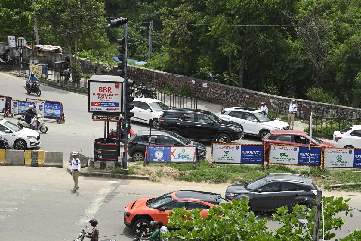 Motorists heading from Alwal towards Bowenpally merging with the traffic at Suchitra X Roads after traffic police officials closed the junction to ease congestion on NH-44, in Hyderabad. Motorists heading from Alwal towards Bowenpally merging with the traffic at Suchitra X Roads after traffic police officials closed the junction to ease congestion on NH-44, in Hyderabad.