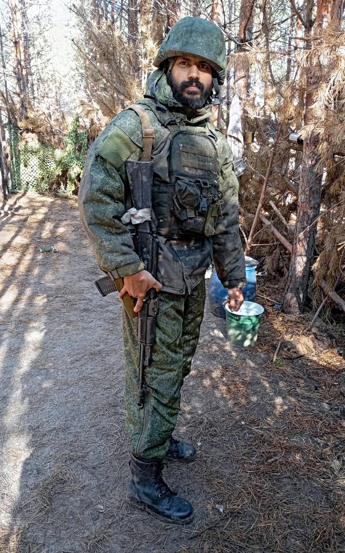 Binil Babu in Russian army fatigues. Binil Babu in Russian army fatigues.