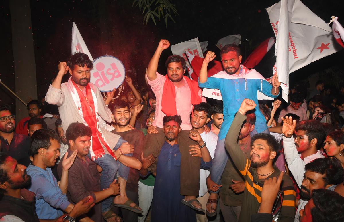 Winning candidates march after winning the student body election inside Jawaharlal Nehru University in New Delhi on March 25, 2024. 