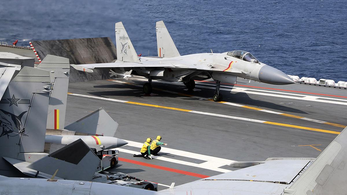 Taiwan reports surge in Chinese air force activity after carrier passes by