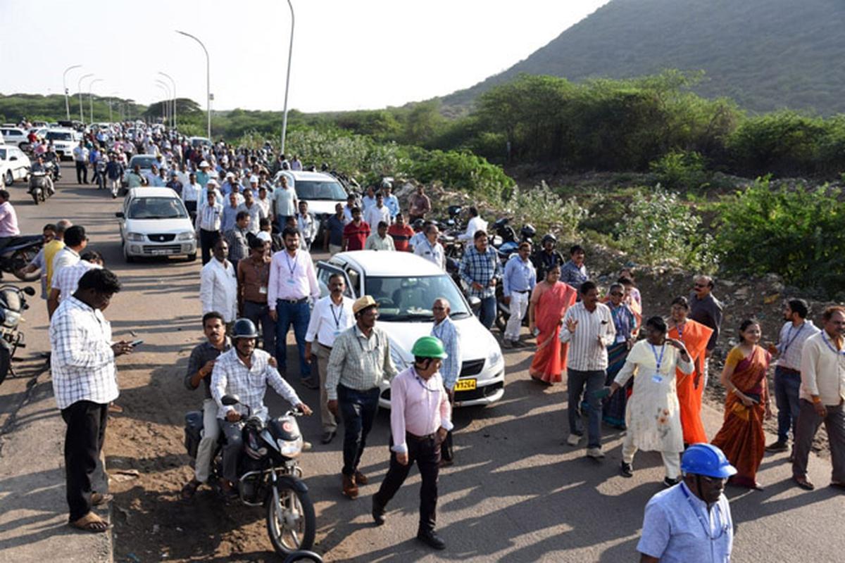 Visakhapatnam Steel Plant employees take out a rally seeking release of coking coal from Adani Gangavaram Port