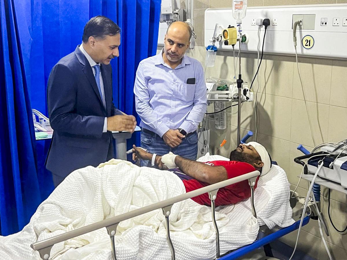 Indian Ambassador to Kuwait Adarsh ​​​​Swaika visits the hospital where workers who suffered injuries in a fire in a building have been admitted, in Mangaf, Kuwait on June 12, 2024.