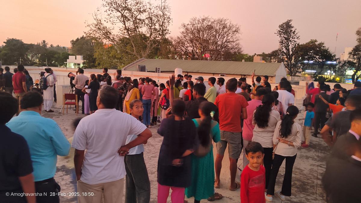 People participating in a ‘Venus and Jupiter watch’ event in Mysuru.