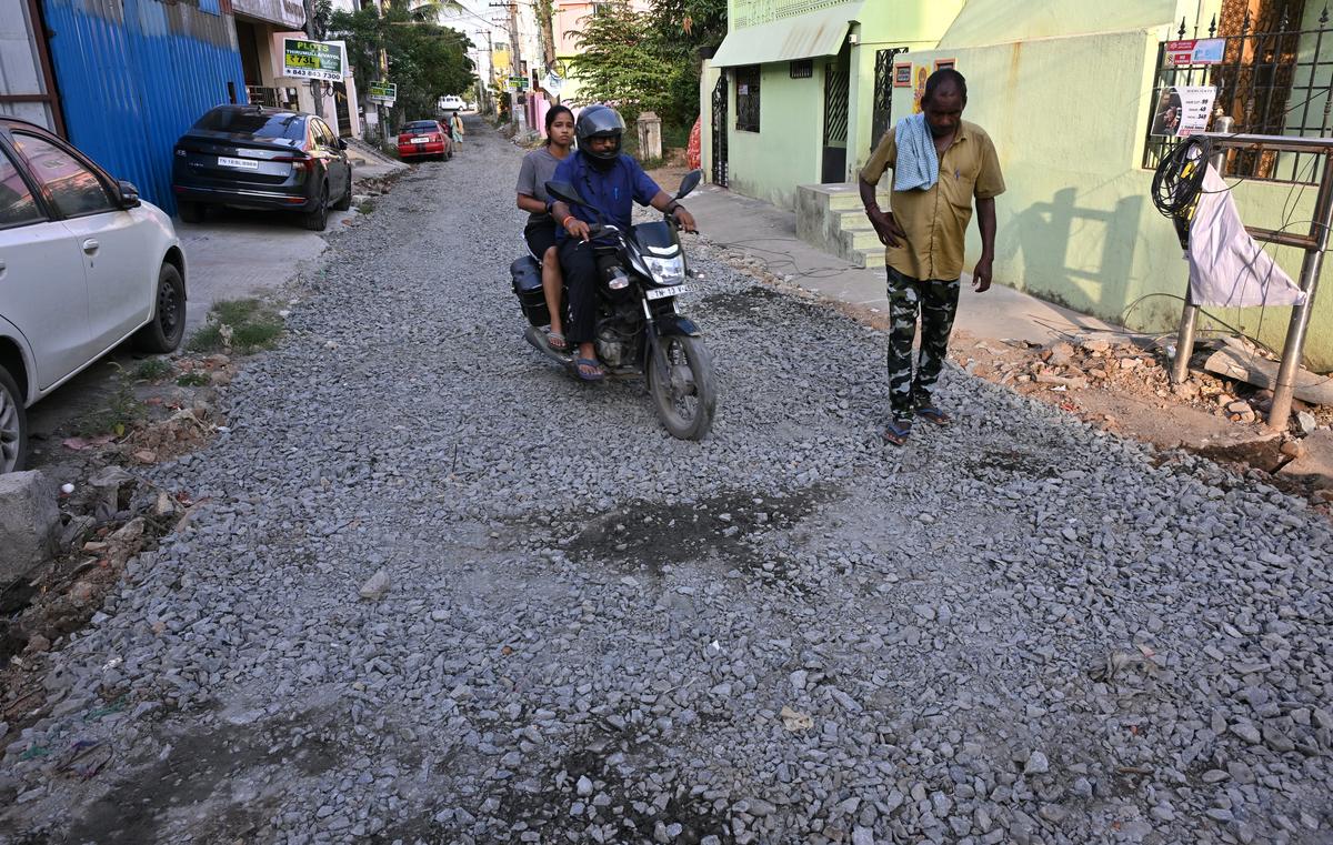 A damaged road at Manikandapuram in Thirumullaivoyal