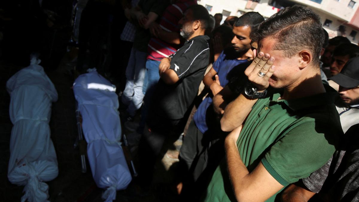 Israeli fire kills at least 18 in Gaza, U.S. envoy visits hostage family protest