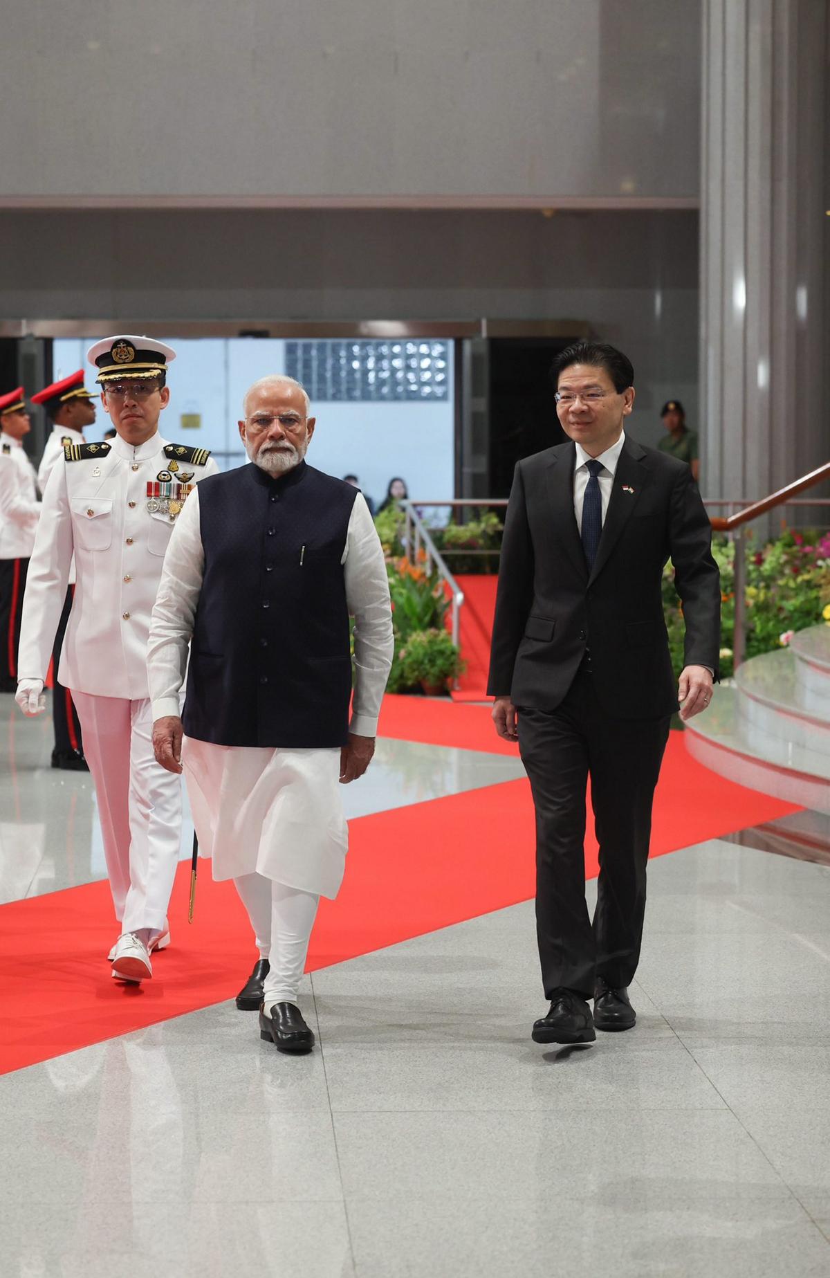 Prime Minister Narendra Modi received a red carpet-welcome at the Singapore Parliament House, in Singapore. 