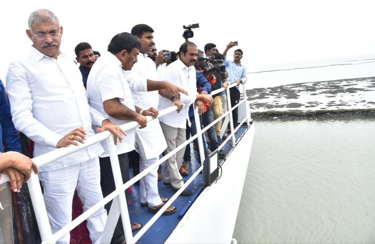Industries Minister Gudivada Amarnath and other public representatives at the anchorage port in Kakinada on Friday.