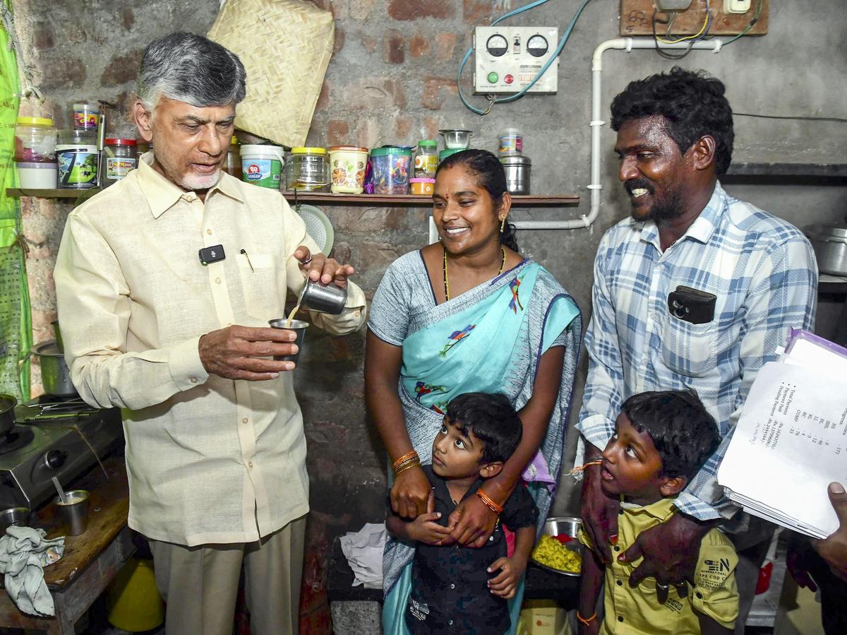 Andhra Pradesh Chief Minister N Chandrababu Naidu drinks tea at the residence of a pension beneficiary, at the Yalamanda village of Palnadu district, Tuesday (December 31, 2024).