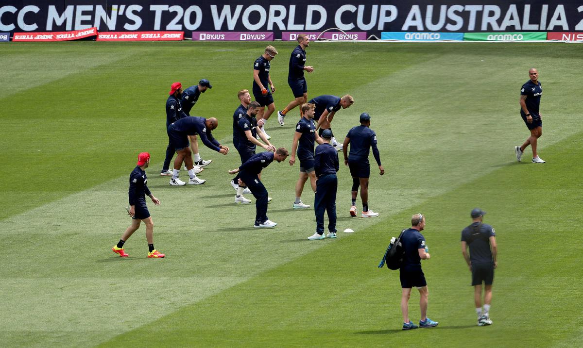 Sweating it out: England players warm up at the MCG.