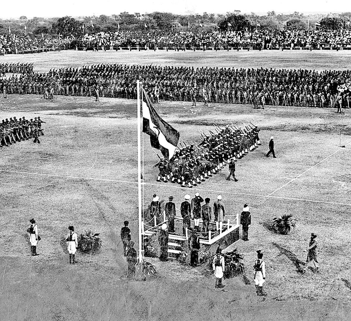 A general view of the Military Review and Flag Hoisting by the President. Dr. Rajendra Prasad at Irwin Stadium. ( pubd. on January 28, 1950)