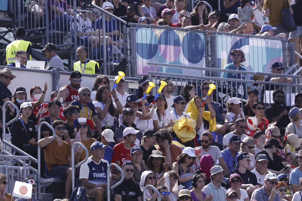 Event attendees cheer and make noise using vuvuzelas during the men’s blind football preliminary match between Japan and Colombia during the Paralympic Games in Paris.