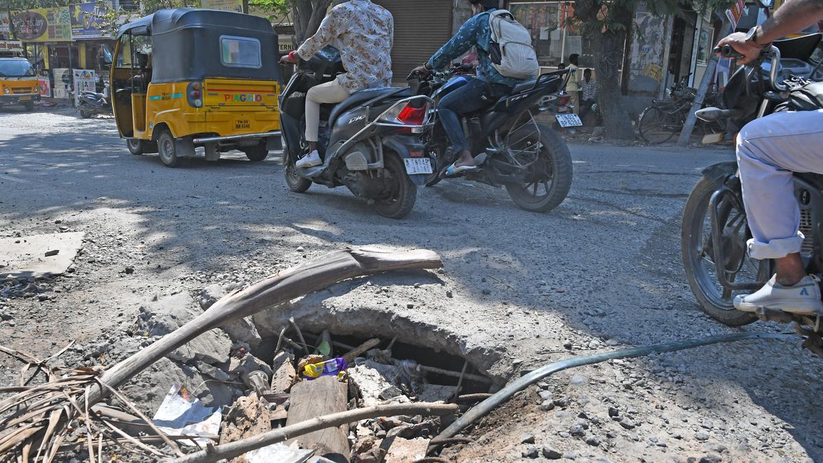 Stephenson Lane, choking on dust and traffic, is in dire need of repair