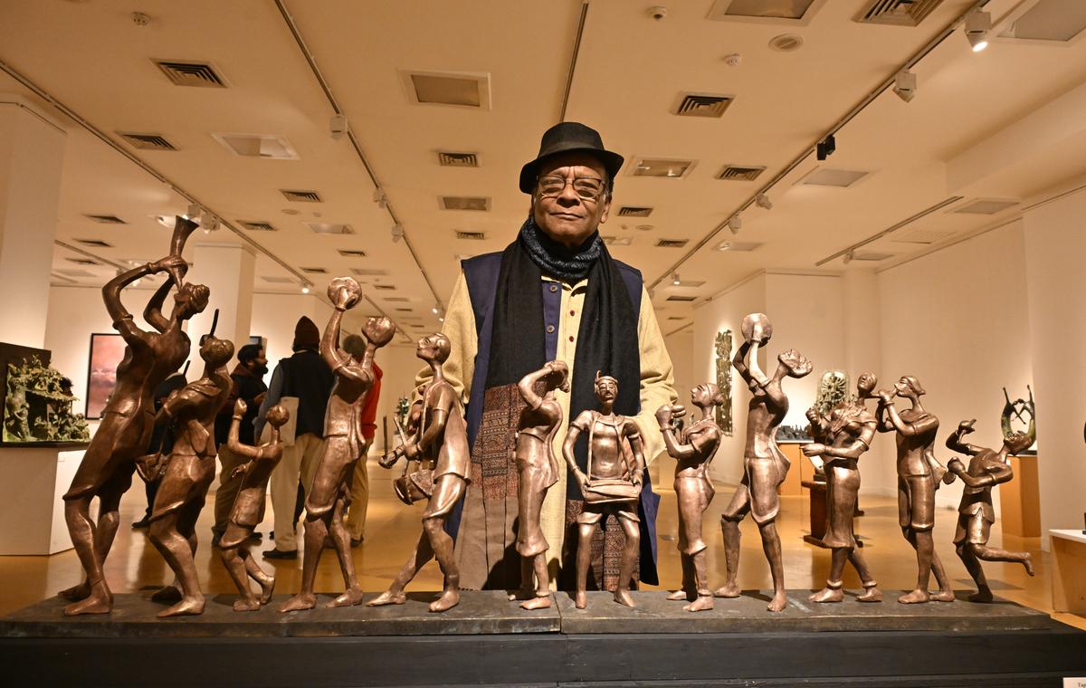 Artist Tapas Sarkar poses with his work at “The Forces of Imagination” exhibition in Delhi. Photo: SHIV KUMAR PUSHPAKAR / The Hindu