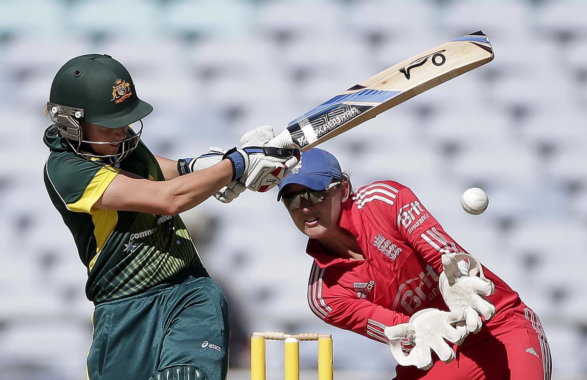 England’s Sarah Taylor, right, ducks out of the way as Australia’s Alyssa Healy plays a shot in their WT20 cricket match during the Women’s Ashes series in Sydney, Australia, Feb. 2, 2014. England’s Sarah Taylor, right, ducks out of the way as Australia’s Alyssa Healy plays a shot in their WT20 cricket match during the Women’s Ashes series in Sydney, Australia, Feb. 2, 2014.