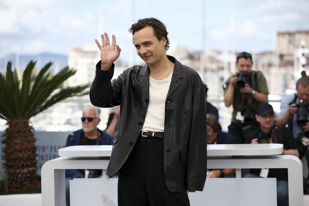 Frank Dillon posted during a photocol for 'Urine' at the 78th Cannes Film Festival