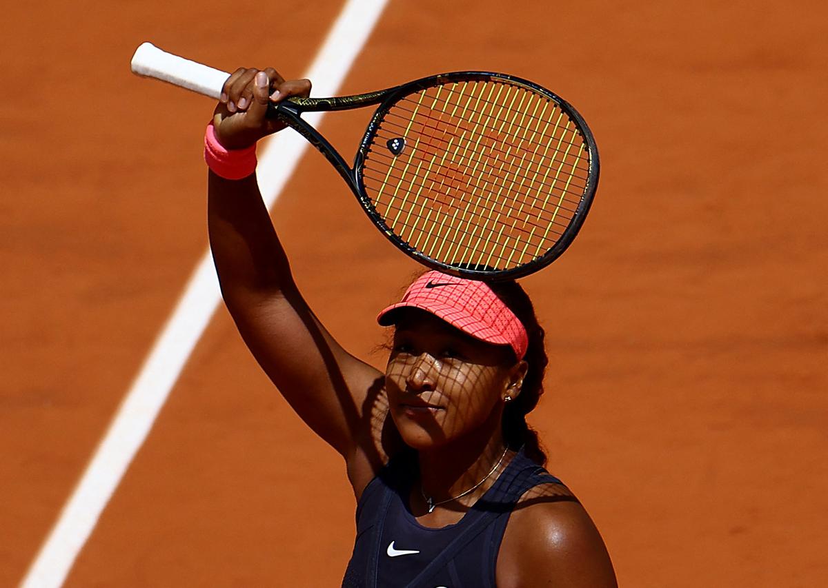 Japan’s Naomi Osaka reacts during her first round match against Italy’s Lucia Bronzetti