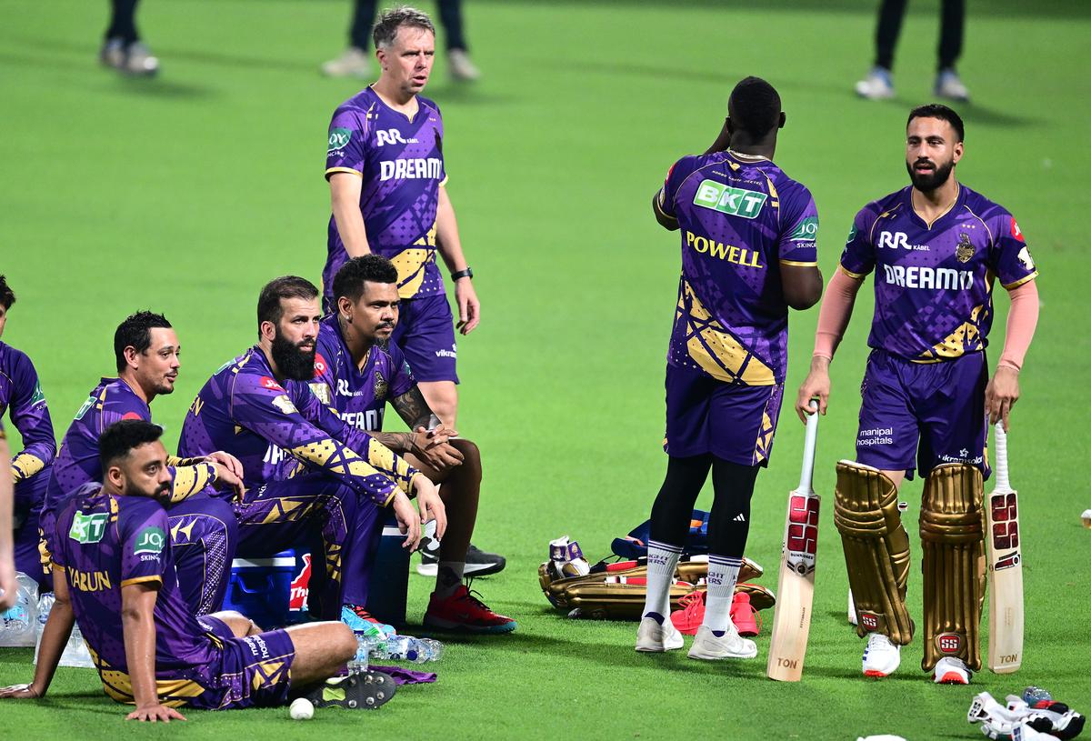 KKR’ players with their spin bowling coach Carl Crowe during a training session ahead of their IPL match against Gujarat Titans at the Eden Gardens in Kolkata on Sunday, 20 April 2025.