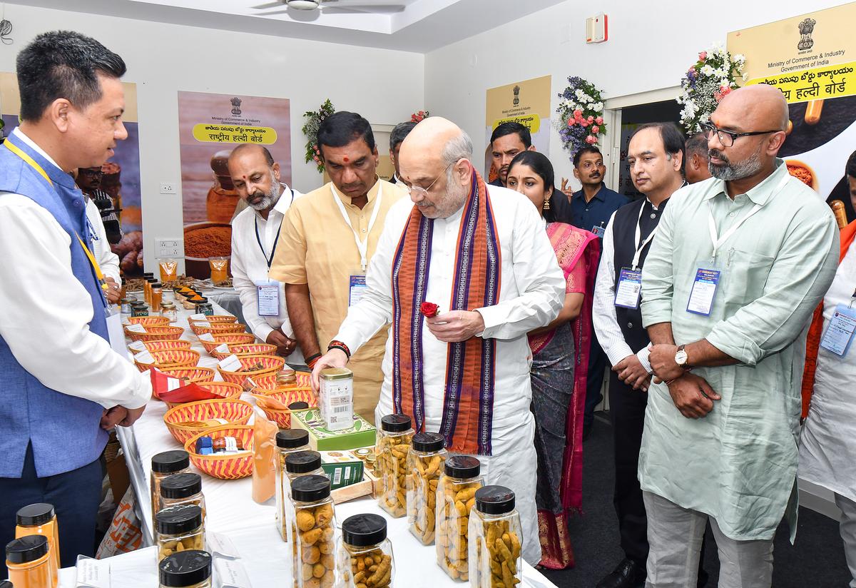 Union Home Minister Amit Shah at a turmeric stall during the inauguration of the National Turmeric Board Headquarters, in Nizamabad on Sunday. Union Minister of State for Home Affairs Bandi Sanjay Kumar also seen. Union Home Minister Amit Shah at a turmeric stall during the inauguration of the National Turmeric Board Headquarters, in Nizamabad on Sunday. Union Minister of State for Home Affairs Bandi Sanjay Kumar also seen.