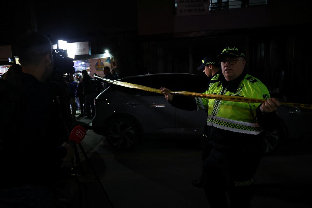 Police officers guard the area where Colombian Senator Miguel Uribe of the opposition Democratic Center party, was shot during a campaign event, in Bogota, Colombia, on June 7, 2025.