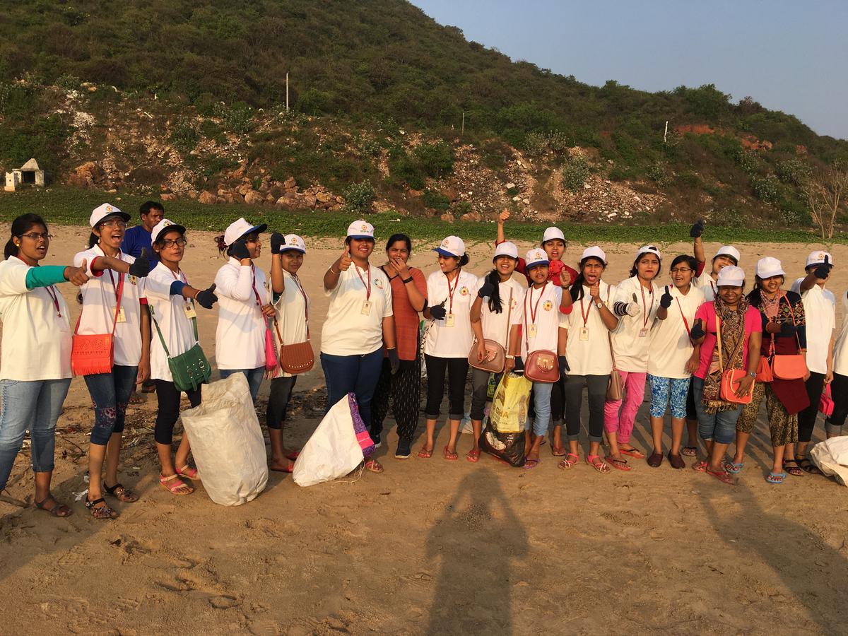 Volunteers of India Youth of Society at a beach cleanup drive in Visakhapatnam.