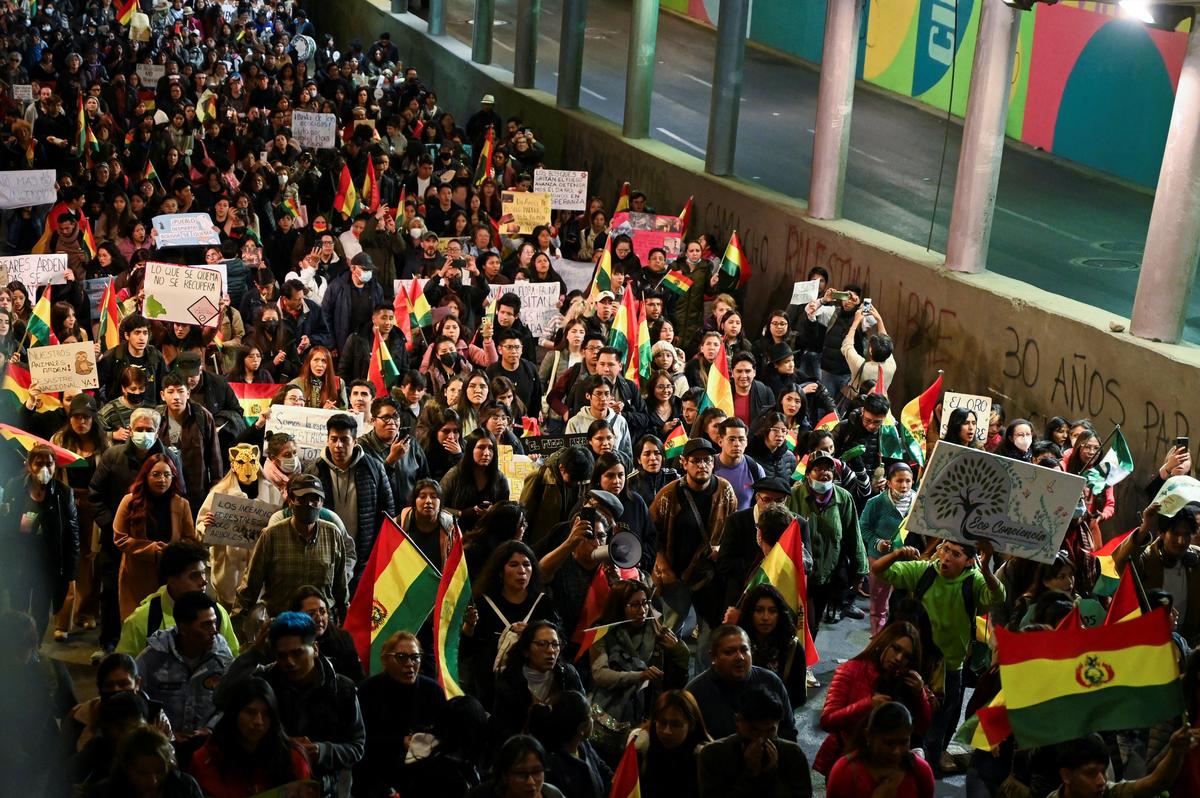 Bolivians take part in a protest against forest fires as the country heads toward potentially a record year of fires, exacerbated by drought and land clearing linked to booming livestock and grain production, in La Paz, Bolivia, September 11, 2024.