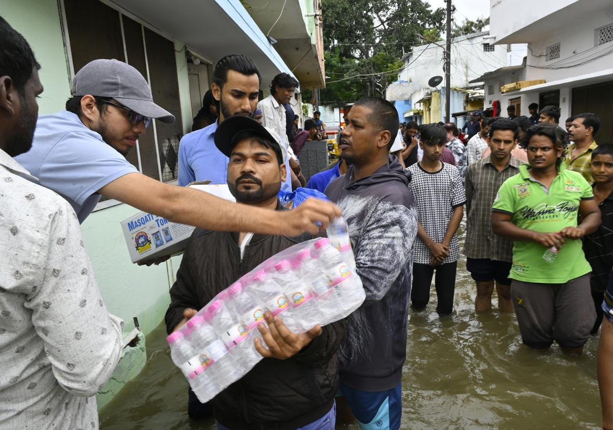 Water being supplied to people in flooded areas in Hyderabad on Saturday