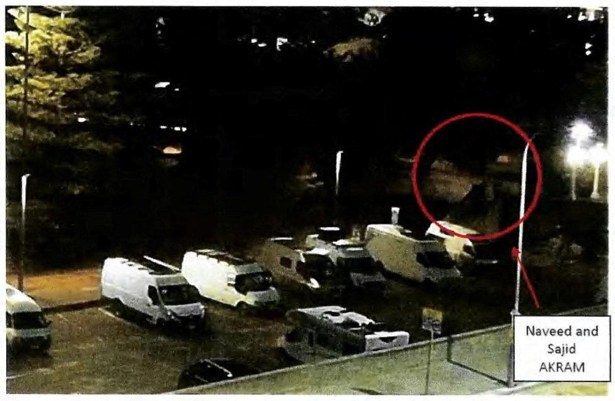 Naveed Akram and his father, Sajid Akram, both suspects in the shooting attack during a Jewish Hanukkah celebration at Bondi Beach on December 14, at a footbridge next to a carpark near Archer Park, Bondi Beach, Sydney, New South Wales, Australia, in this still image taken from a court document released on December 22, 2025.