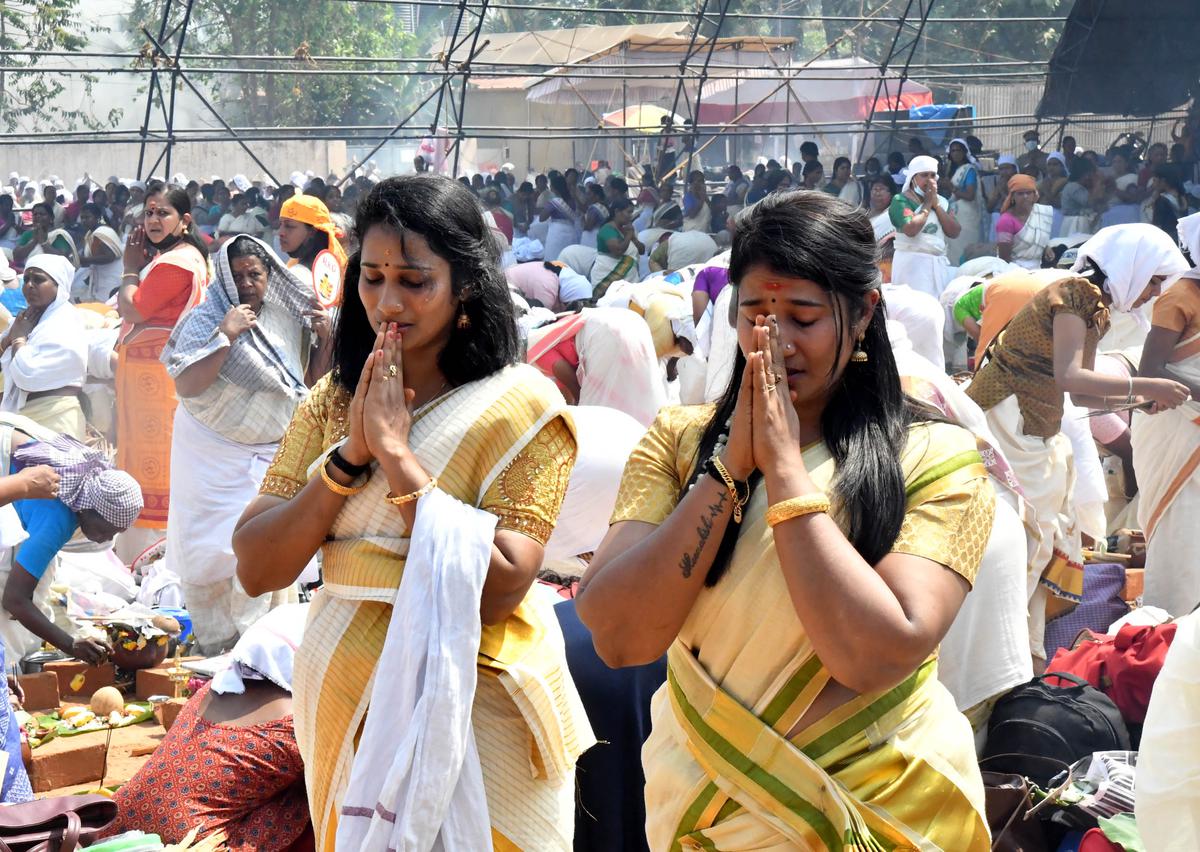 Devotees offer prayers during the annual Attukal Pongala festival in Thiruvananthapuram on Tuesday.
 