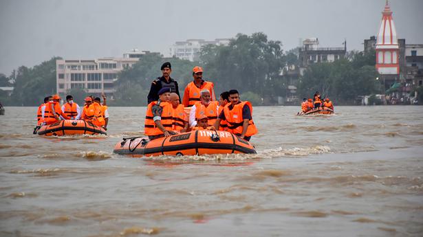 Yogi Adityanath conducts aerial survey in eastern U.P., meets flood victims
