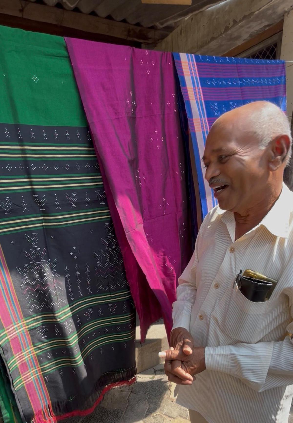 Jahabhai with his latest collection of saris Jahabhai with his latest collection of saris