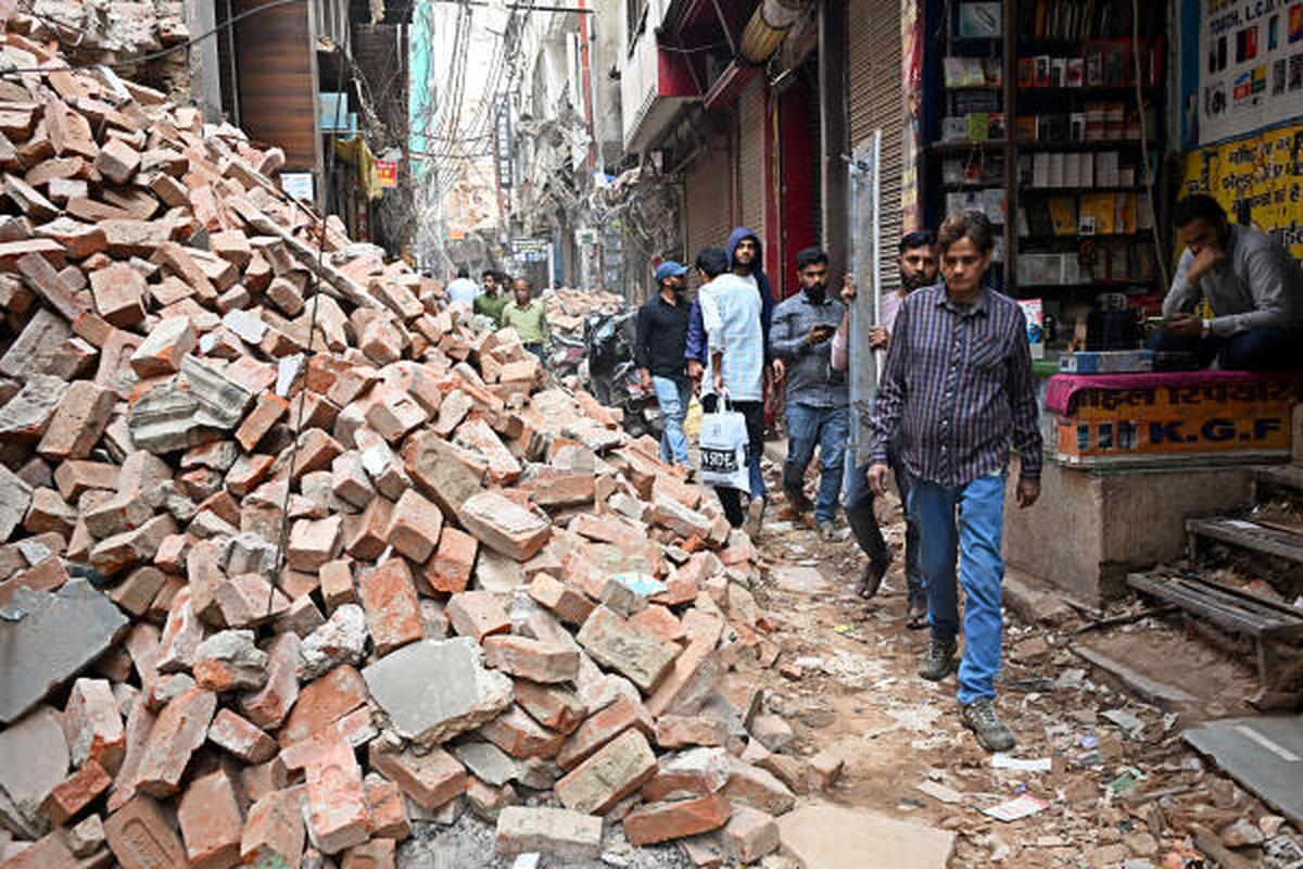 Demolation drive going on for road-widening project at Dal Mandi market in Varanasi. Demolation drive going on for road-widening project at Dal Mandi market in Varanasi.