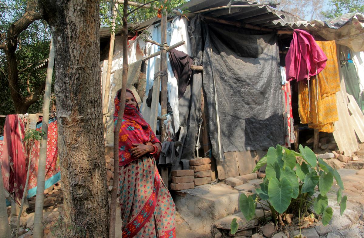 A woman whose son, a migrant worker, died outside Odisha.  