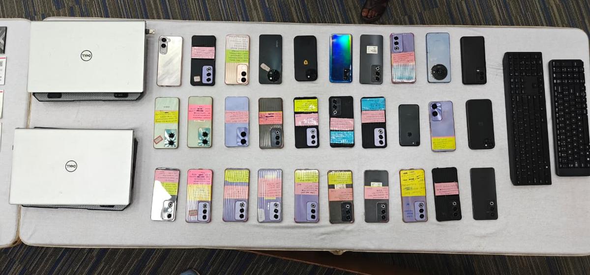 Seized electronics include two laptops, 30 mobile phones and keyboards 