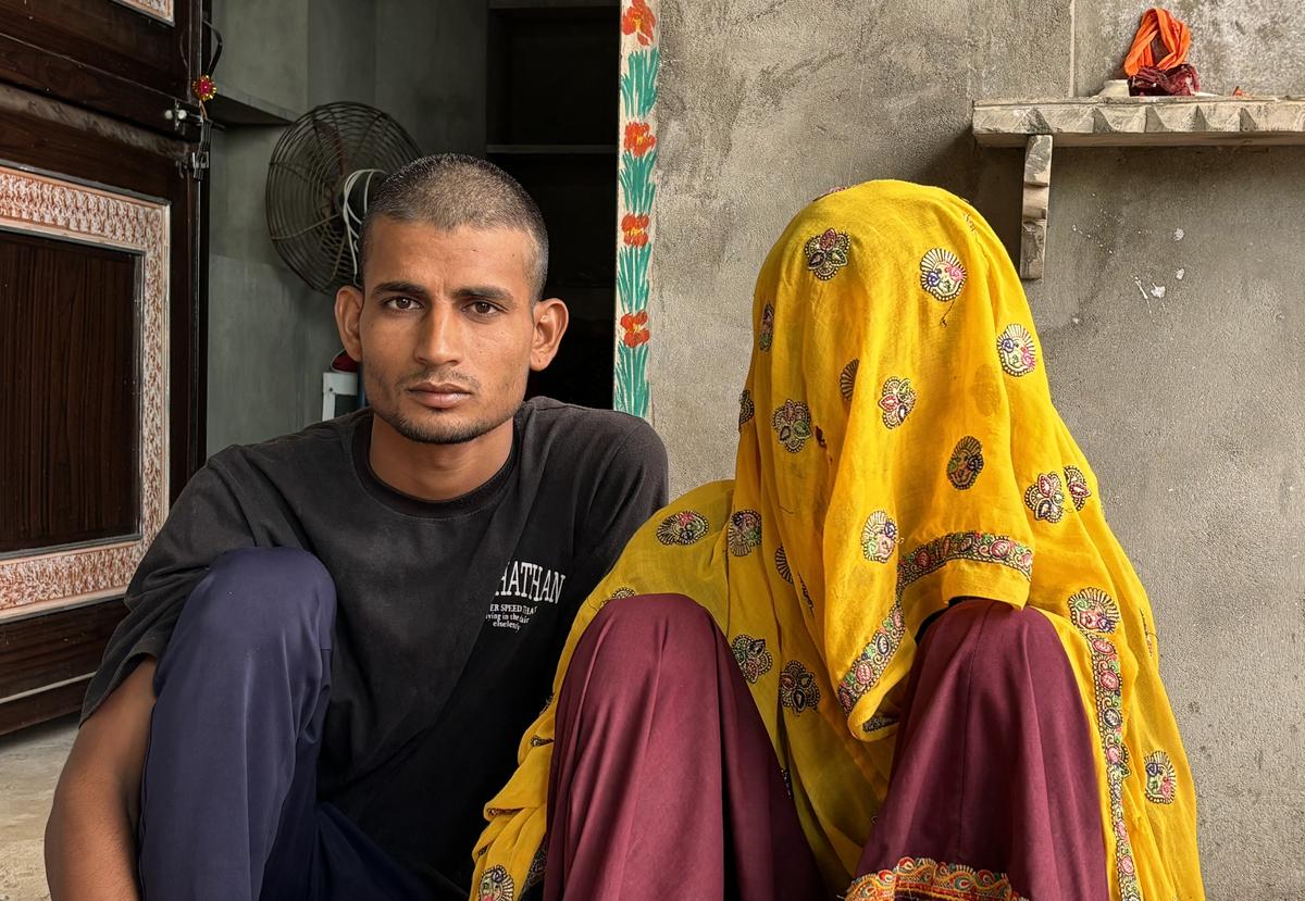 Prasathi Meena, whose husband Bharat Lal Meena was killed in a tiger attack, with her son at Uliyana village in Rajasthan’s Sawai Madhopur district.        