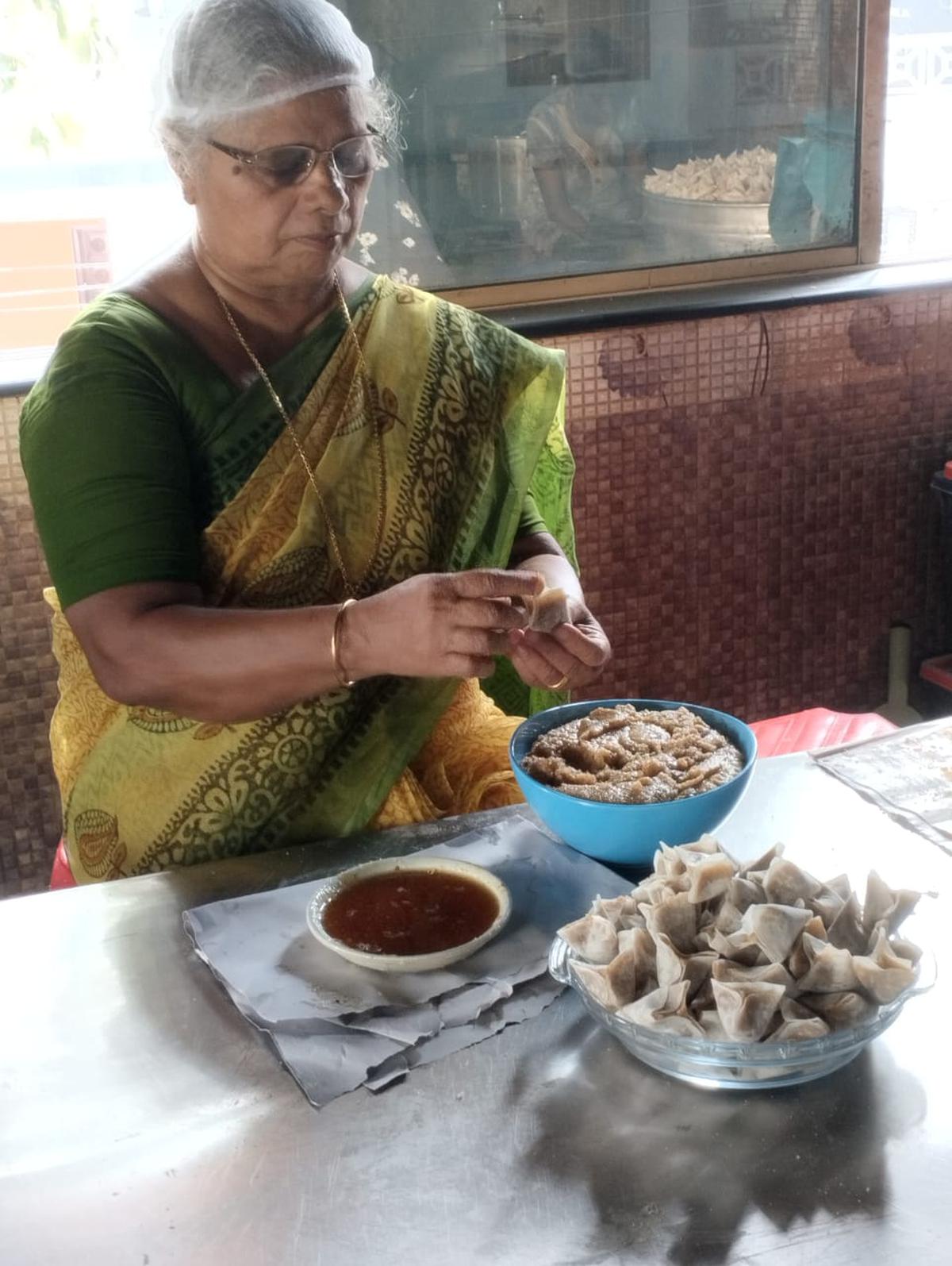 Kathrina Joseph makes Churuttu, a speciality of Mammi Chedathy’s outlet. 