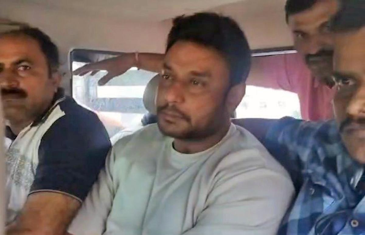 Kannada actor Darshan Thoogudeepa is being sent to police custody after medical examination following his alleged role in a murder over obscene messages, on June 11, 2024 at Bowring and Lady Curzon Hospital, Bengaluru. Kannada actor Darshan Thoogudeepa is being sent to police custody after medical examination following his alleged role in a murder over obscene messages, on June 11, 2024 at Bowring and Lady Curzon Hospital, Bengaluru.