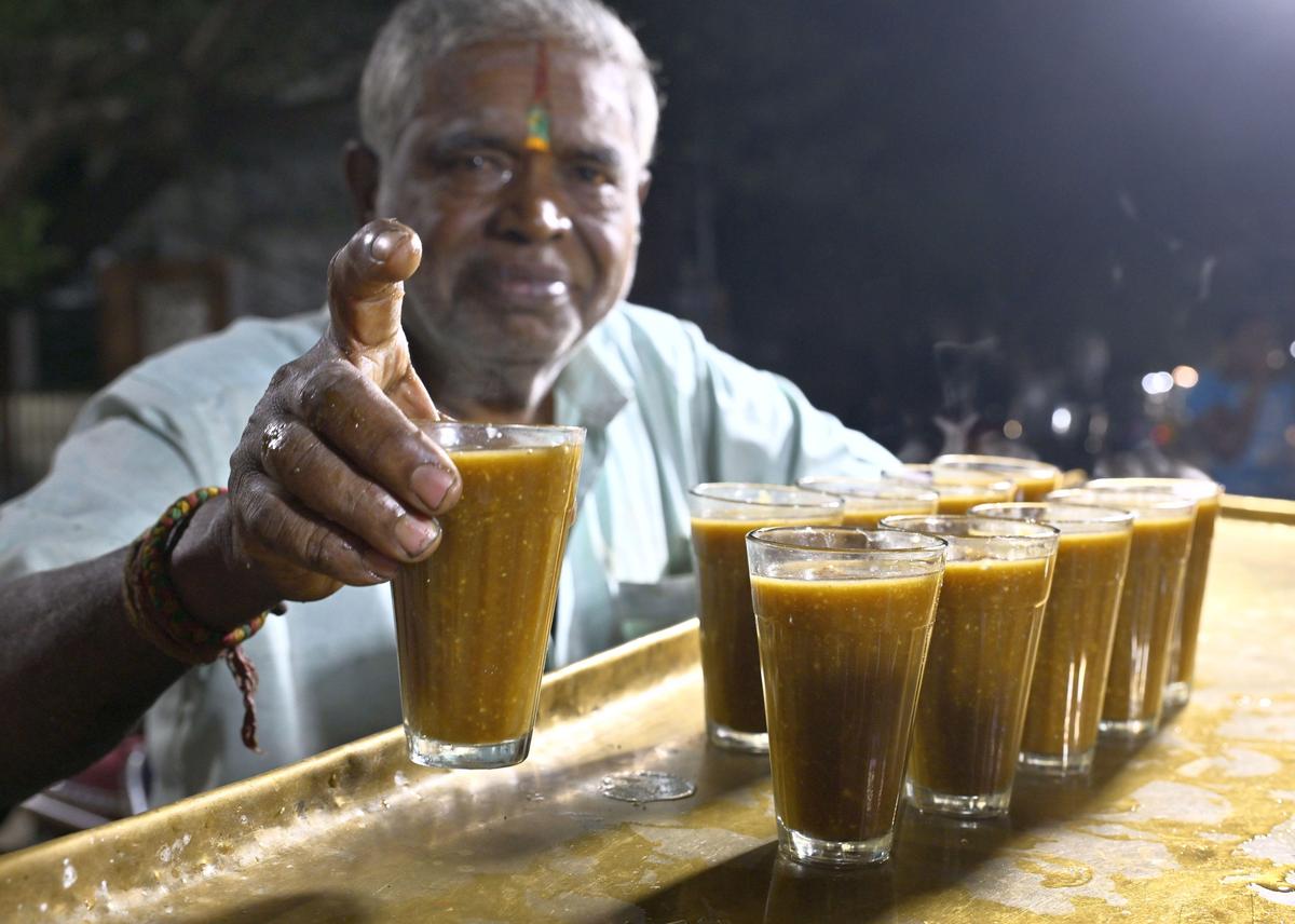  K.Santhanam serving hot Paruthipaal (cottonseed milk) at his shop in Madurai. 